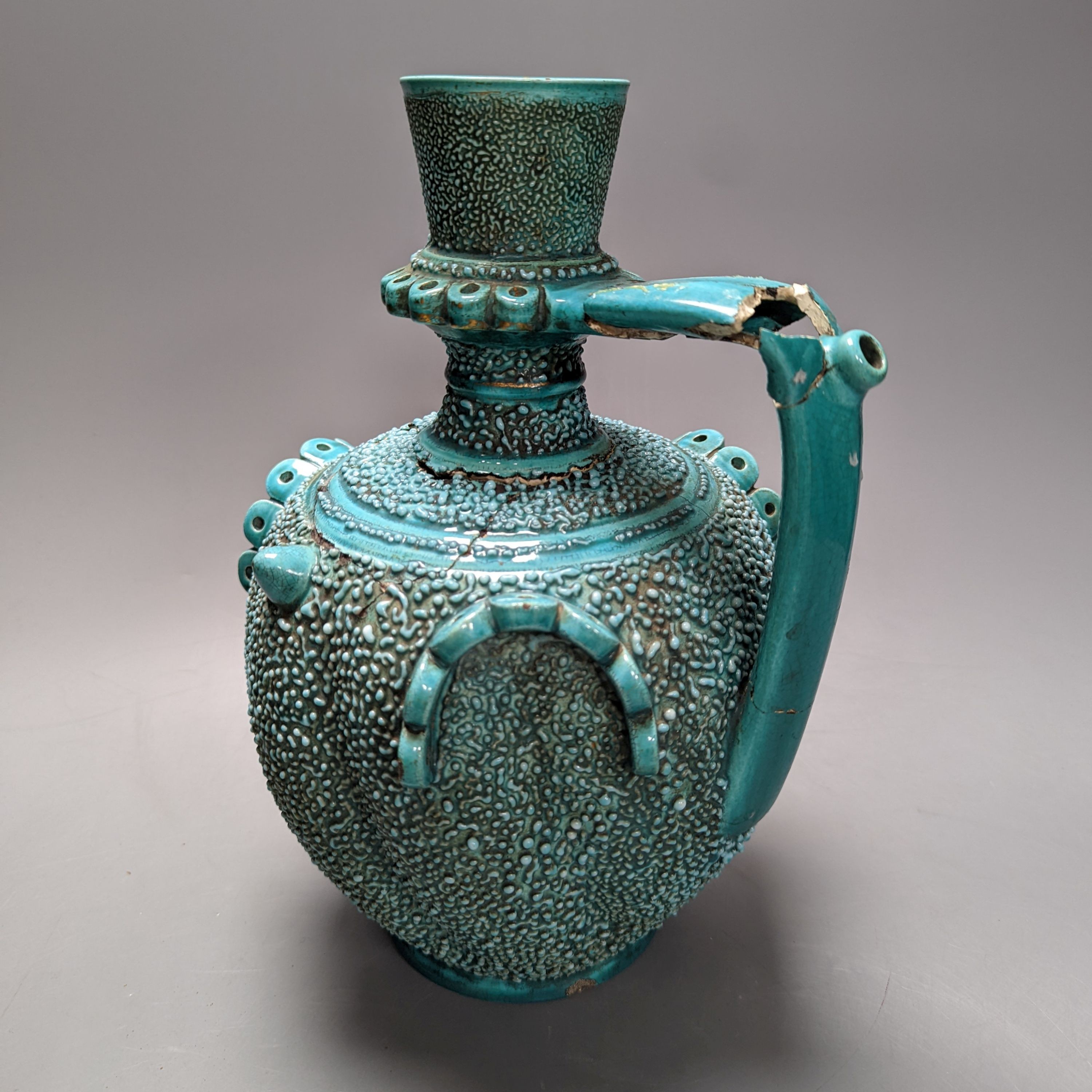 A Zsolnay turquoise glazed ewer (a.f.) 30cm